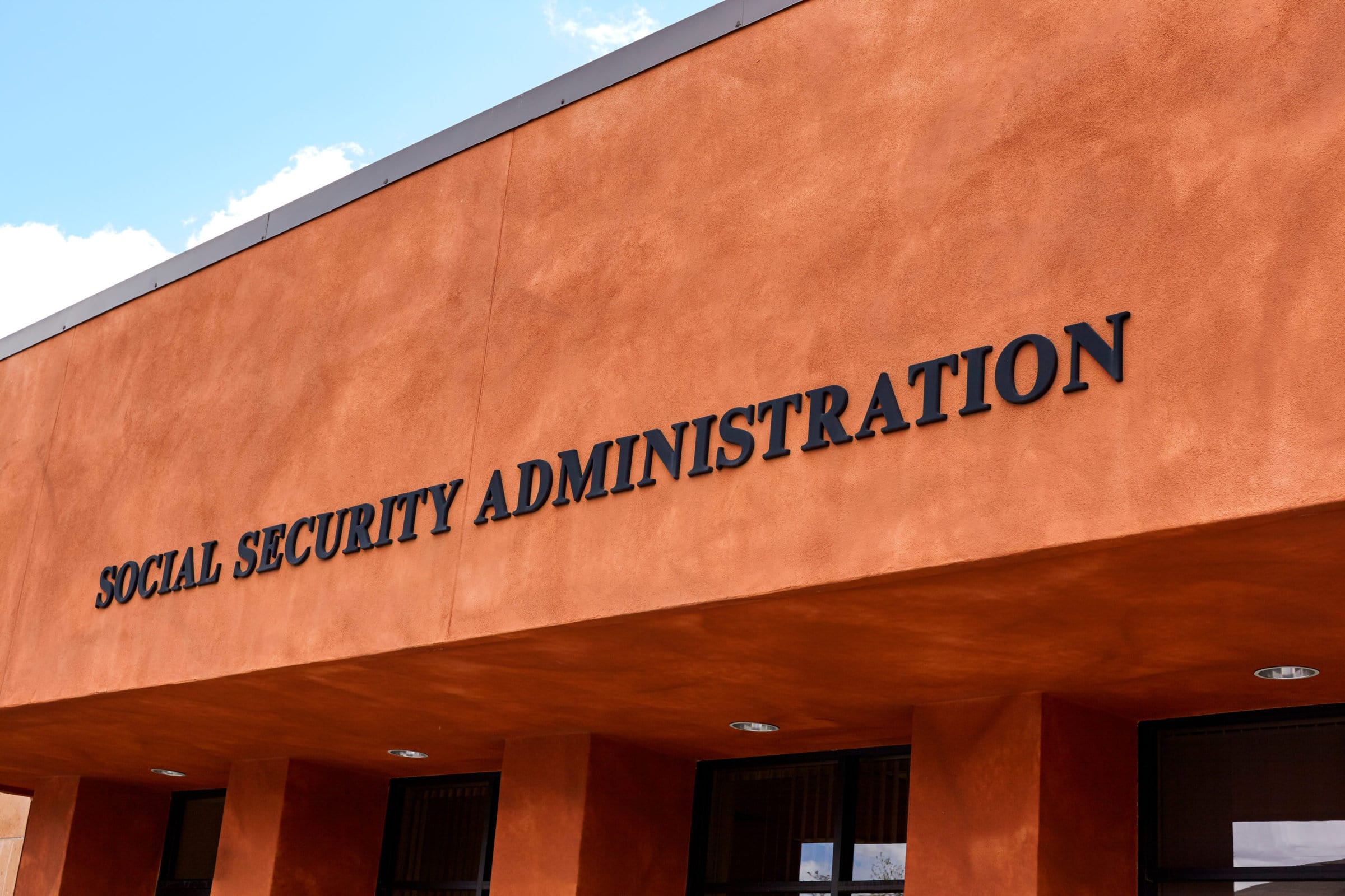 Social Security Administration Sign Sign on front of government building reading Social Security Administration