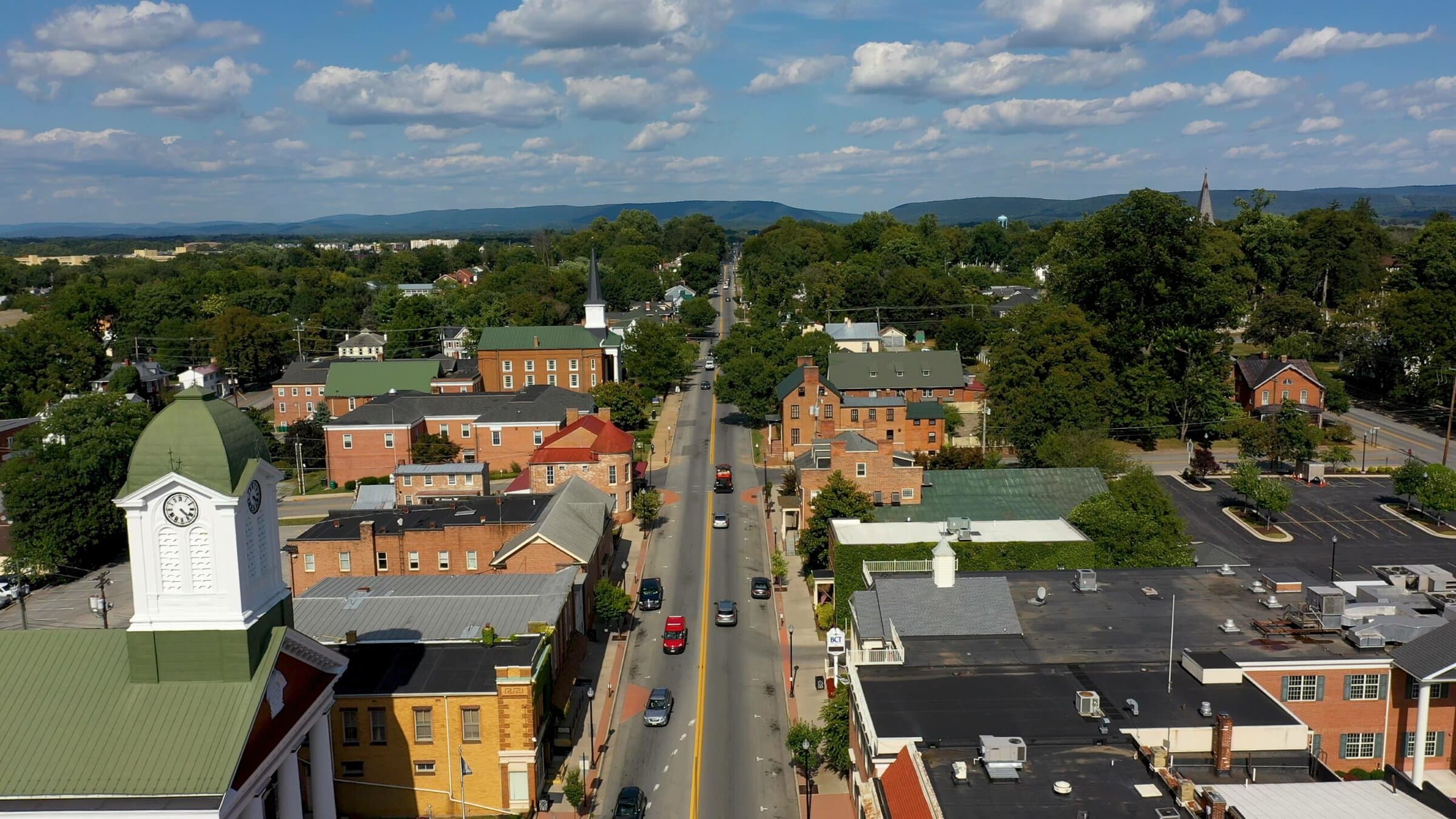 Low aerial view of main street usa, Charles Town, West Virginia, WV on a beautiful sunny day.