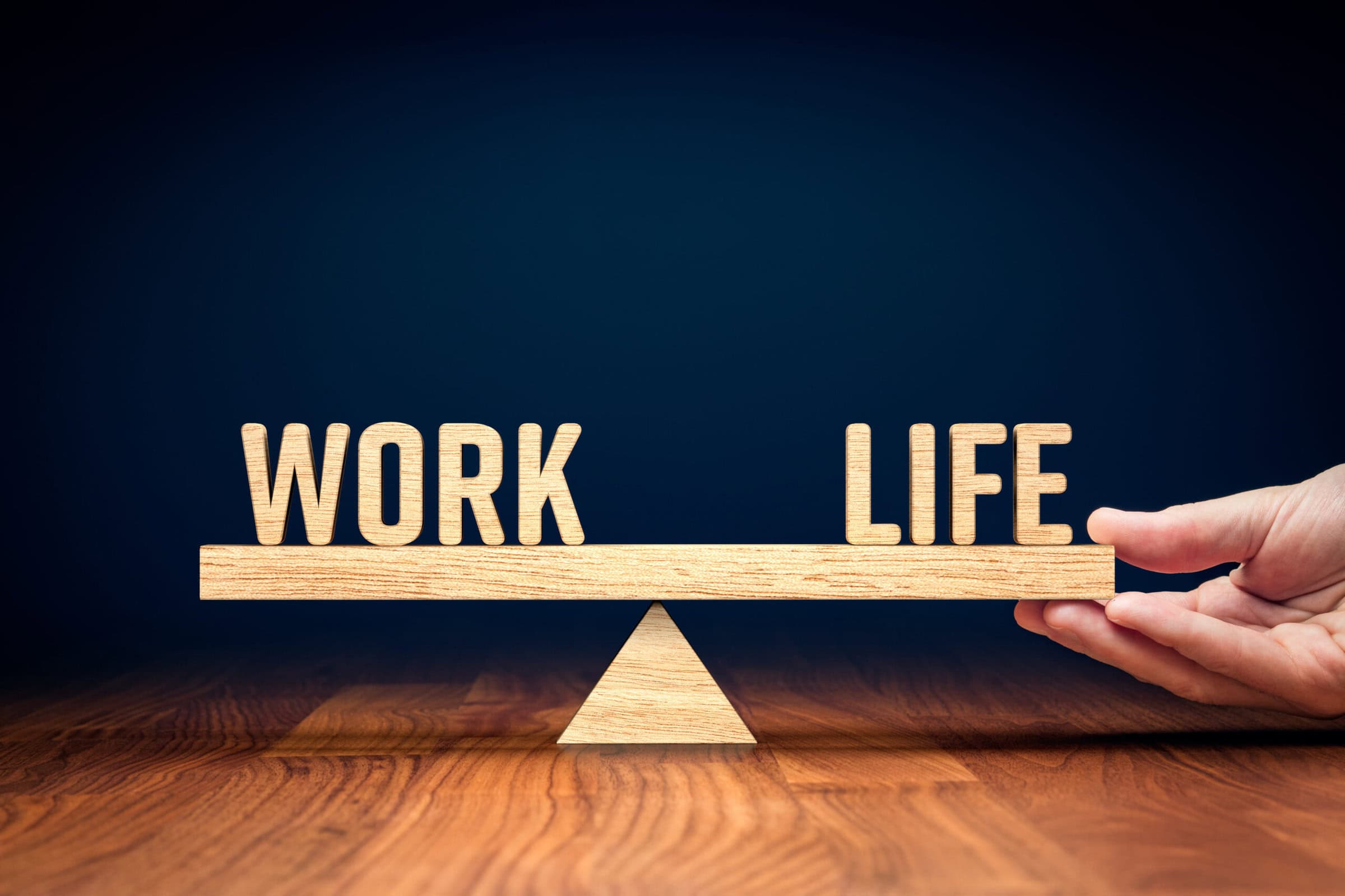 Work life (work-life) balance concept. Helping hand of personal coach helps with work and life balance.
