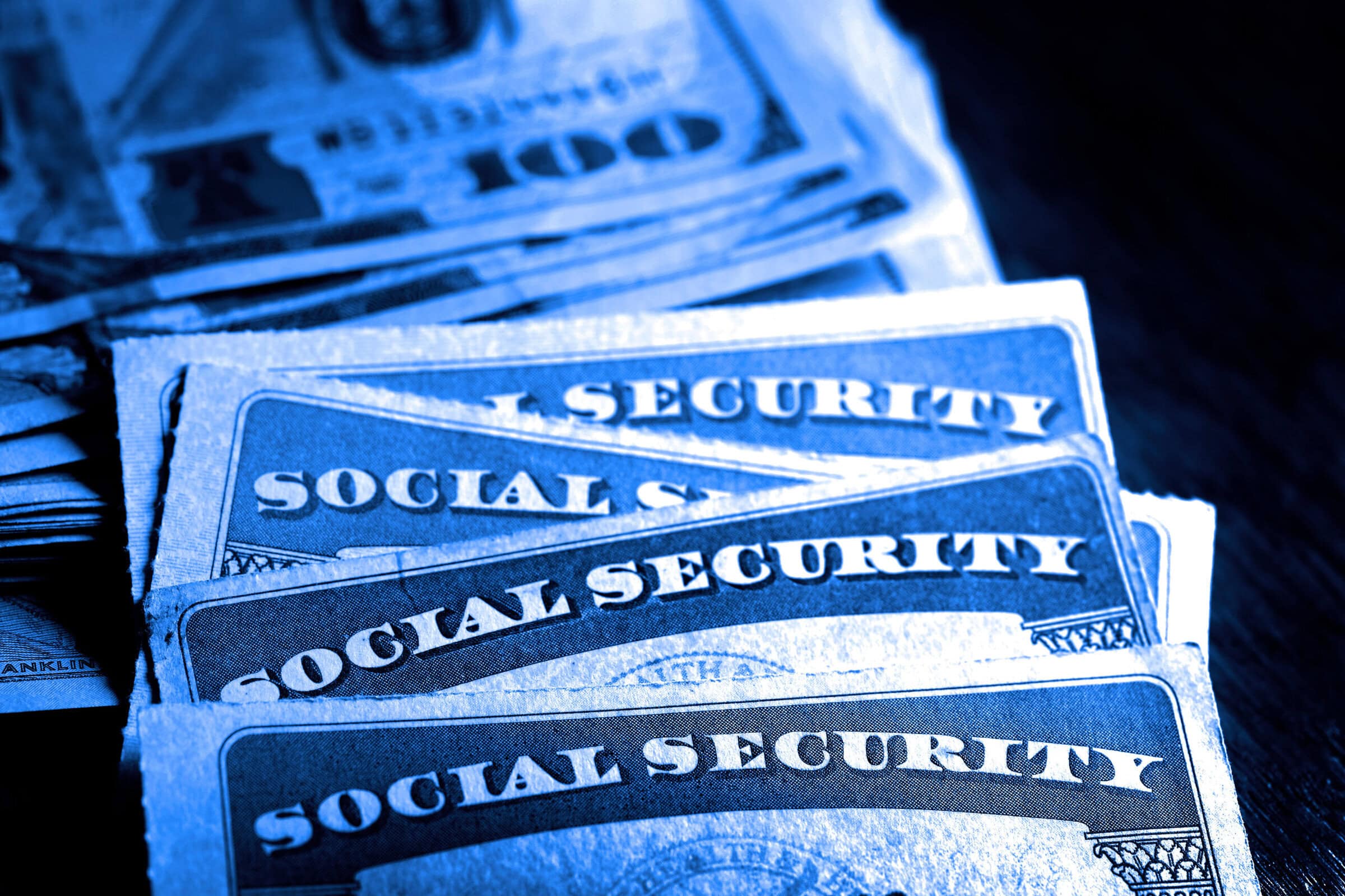 Social Security Cards with Cash Savings Retirement Social Security cards with cash money for savings and retirement