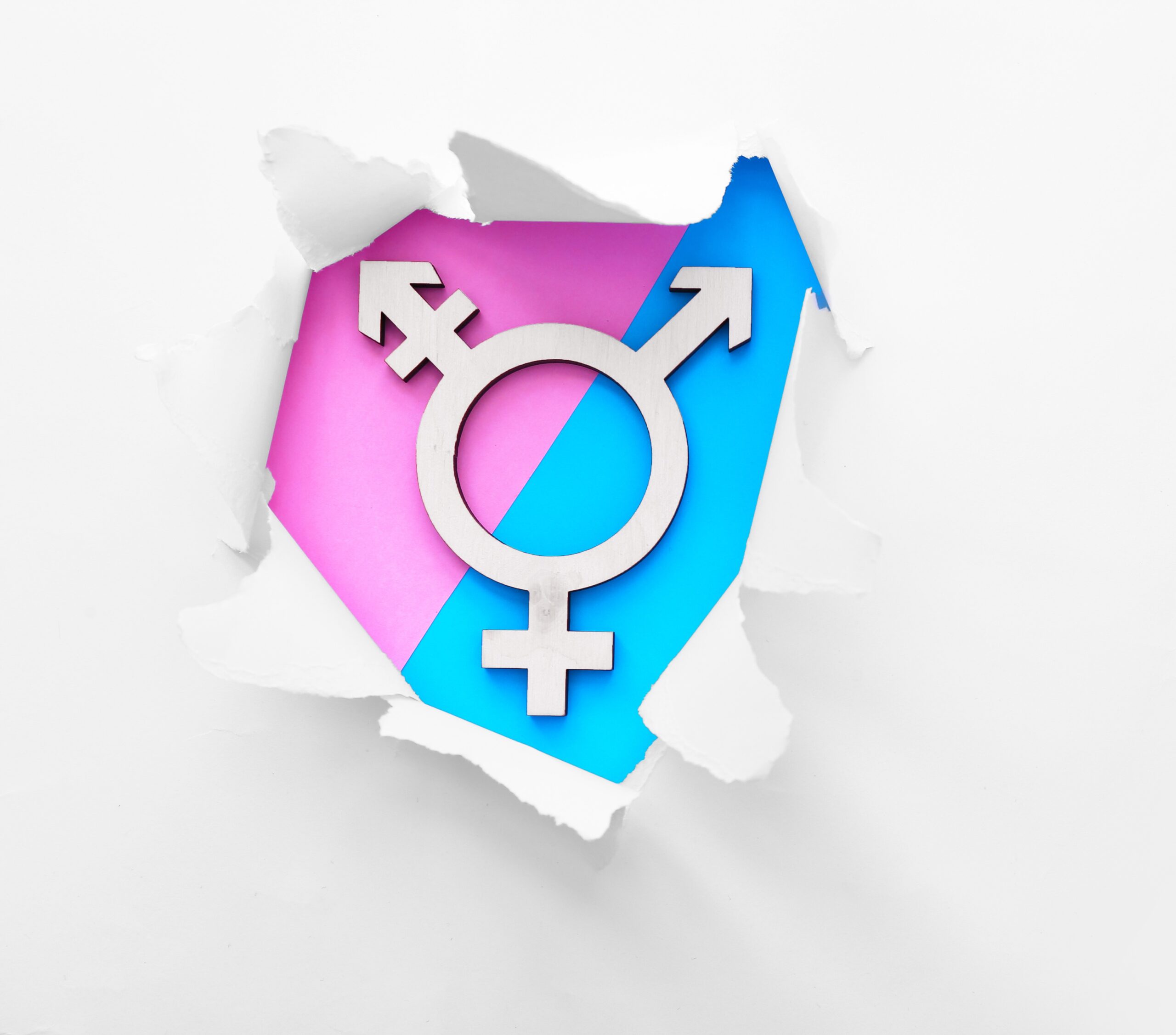 Symbol of transgender visible through torn paper on color background