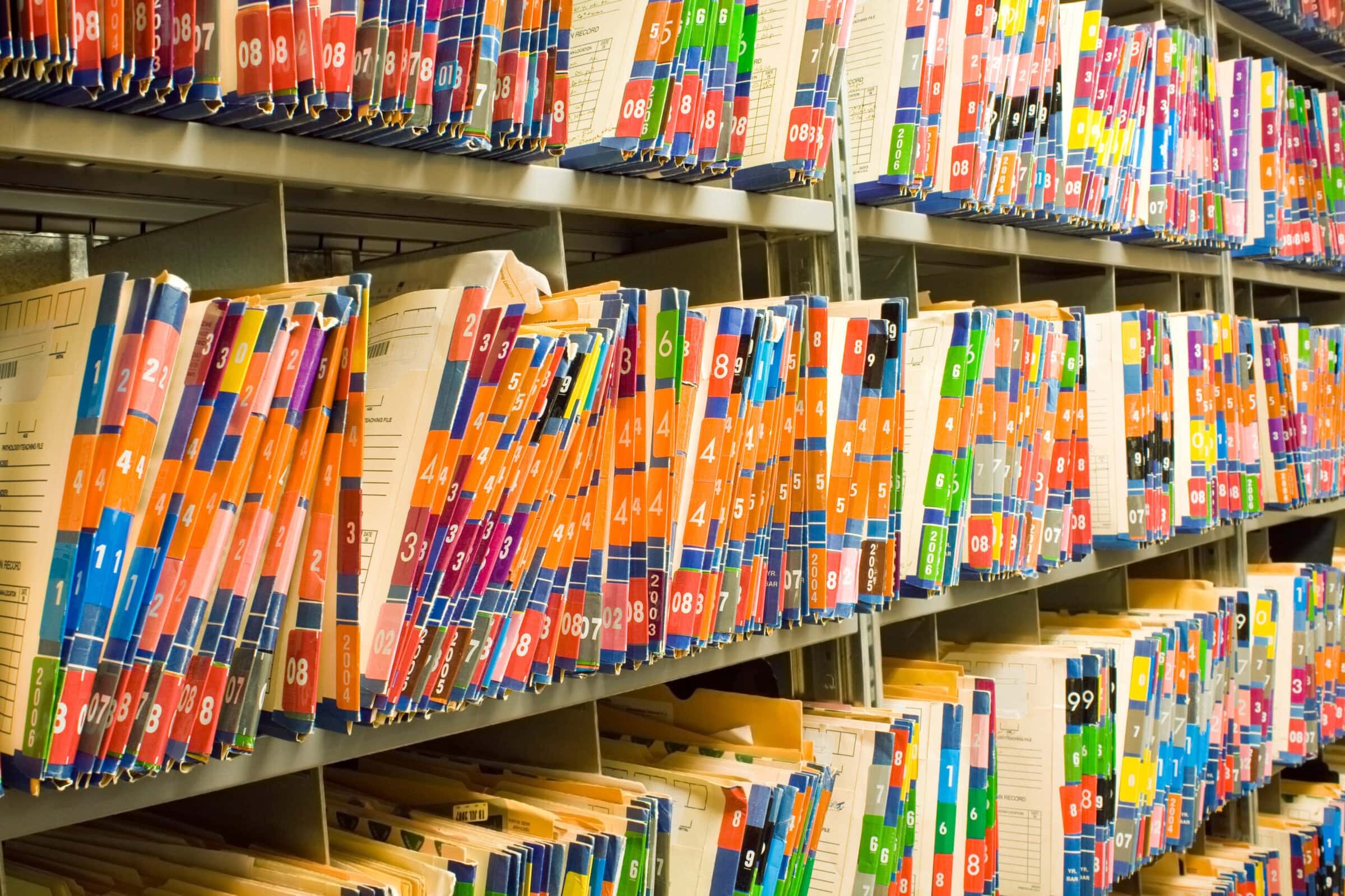Rows of Colorful Medical Records - Patient Charts Rows of Colorful Medical Records - Patient Charts