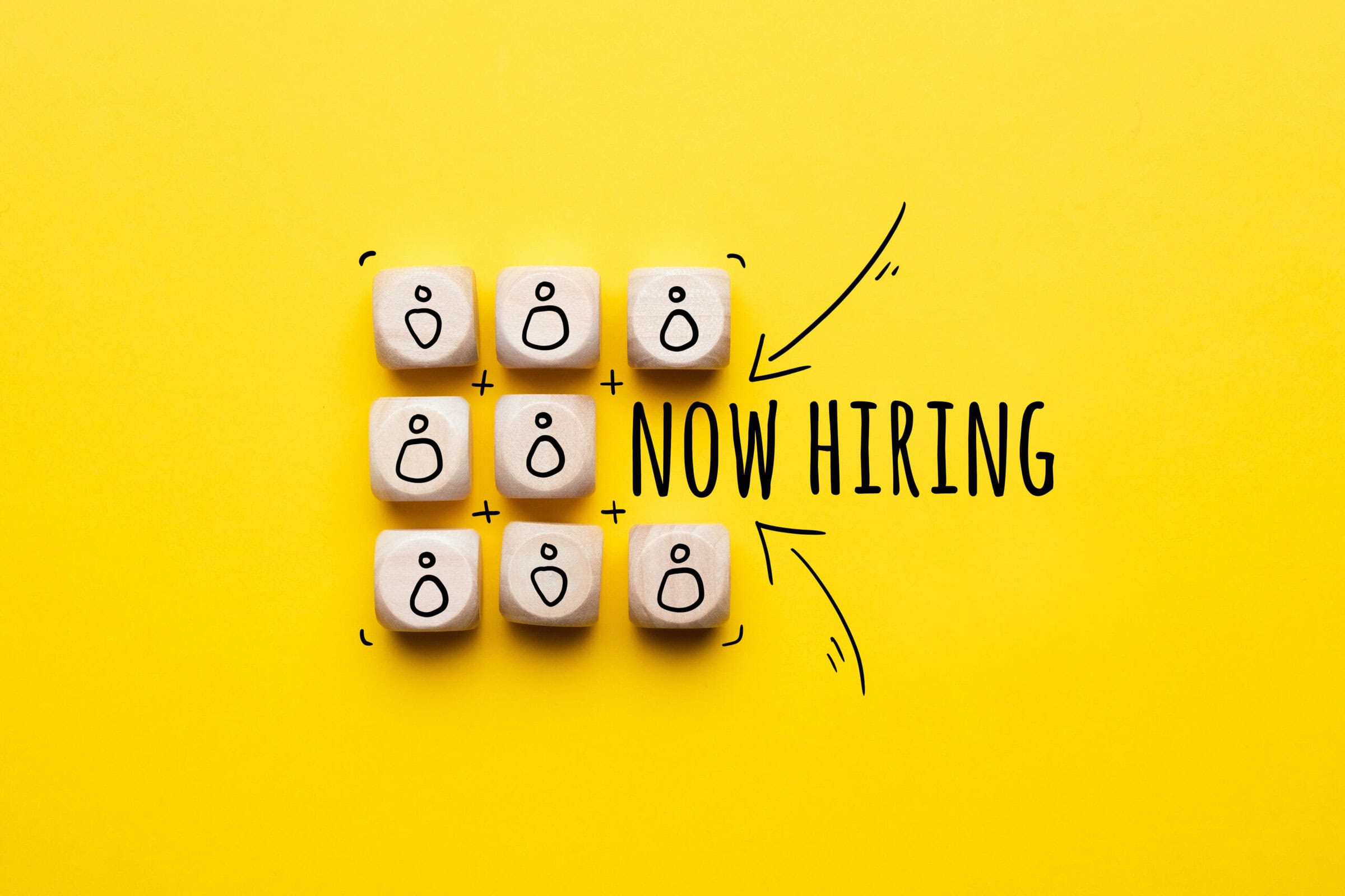 Concept is now hiring. Abstract staff icons on dice. Concept is now hiring. Abstract staff icons on dice