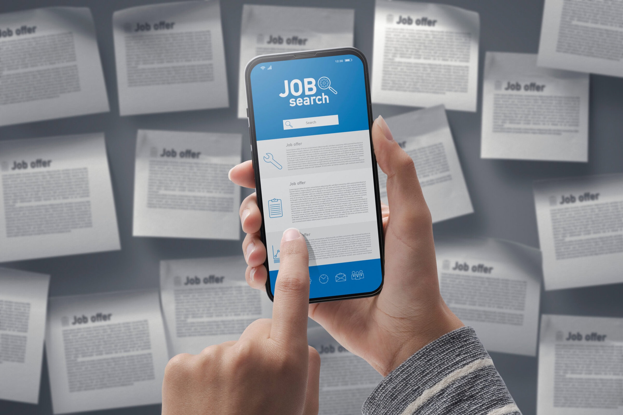 Job search app on smartphone: woman searching for a professional occupation online